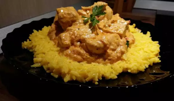 Chicken Tikka Masala with Sour Cream and Coconut Flakes