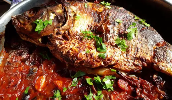 Stuffed Carp with Tomatoes and Onions