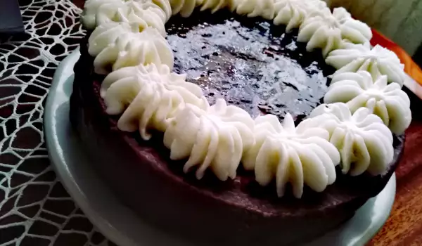 Festive Cake with Liquid Chocolate and Cream