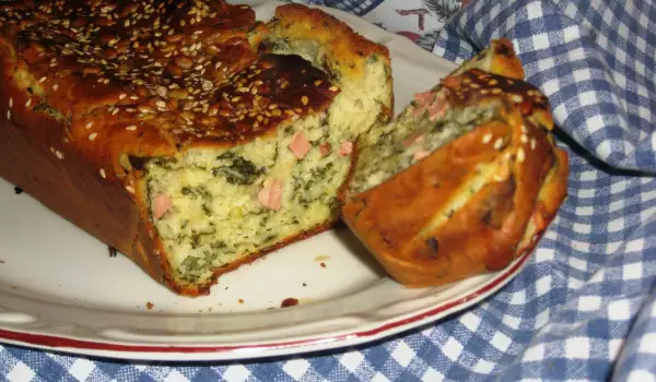 Salty Cake with Dock, Sausages and Seeds