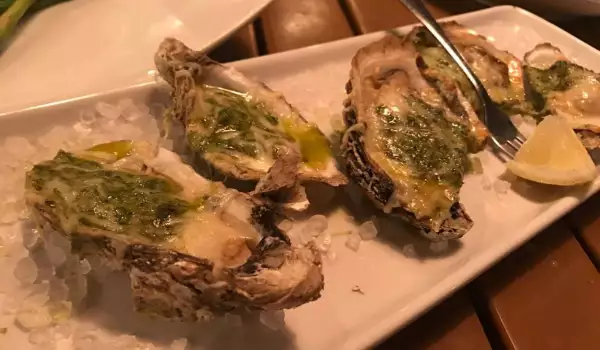 Mediterranean-Style Oysters with Baby Spinach