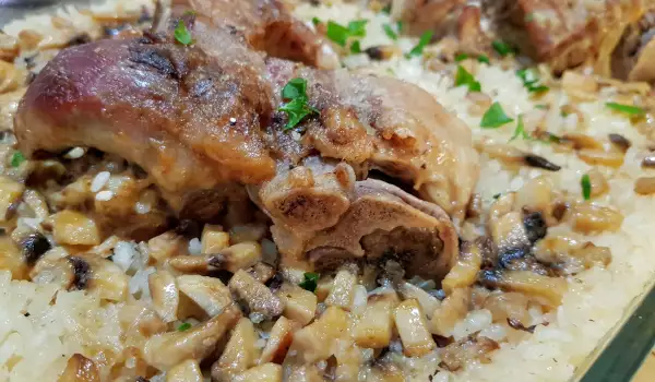 Oven-Baked Pork Shank with Rice and Mushrooms