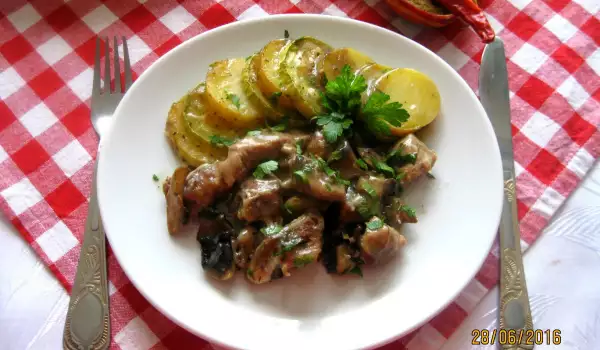 Pork Bits with Mushroom Sauce, Zucchini and Potatoes