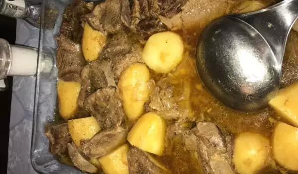 Beef Tongue with Onions and Baked Potatoes