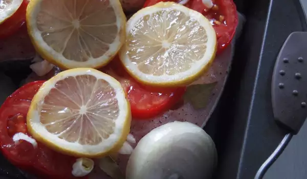 Baked Silver Carp with Tomatoes and Onions