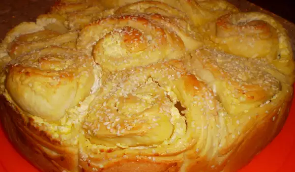 Traditional Bulgarian Tutmanik with Butter and Feta Cheese