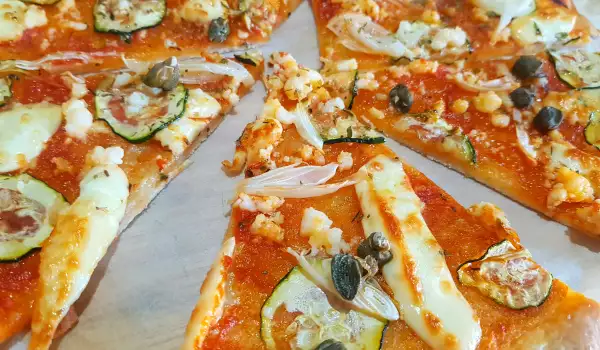 Thin Pizza with Mozzarella, Ricotta and Zucchini