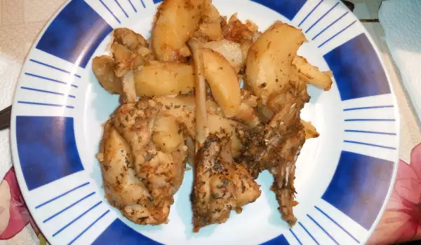 Tender Rabbit with Potatoes in the Oven
