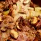 Pork Neck with Onions and Mushrooms in a Guvec