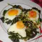 Eggs Sunny Side Up on a Bed of Dock and Spinach