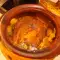 Tasty Pork Shank with Potatoes in a Clay Pot