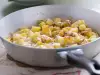 Potatoes with Cheese in a Pan