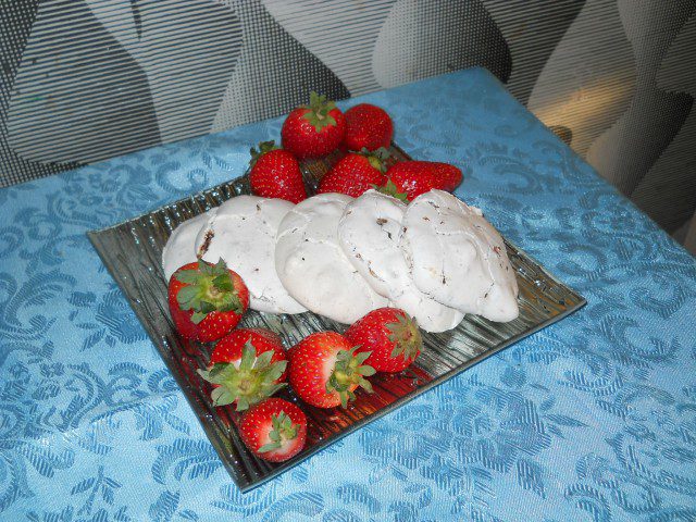 Meringues with Chocolate and Walnuts, Garnished with Strawberries