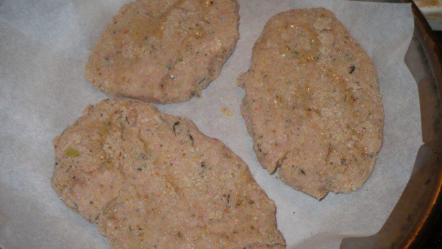 Crunchy Schnitzels with Potatoes and Mince in the Oven