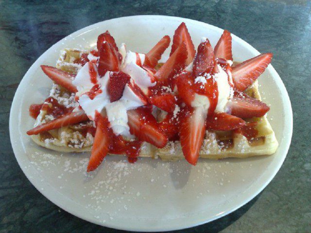 Waffles with Homemade Cream, Strawberries and Mint