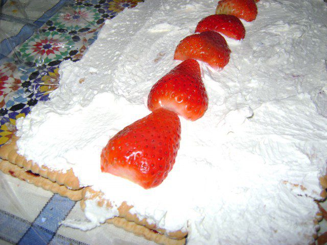Biscuit Roll with Cream and Strawberries