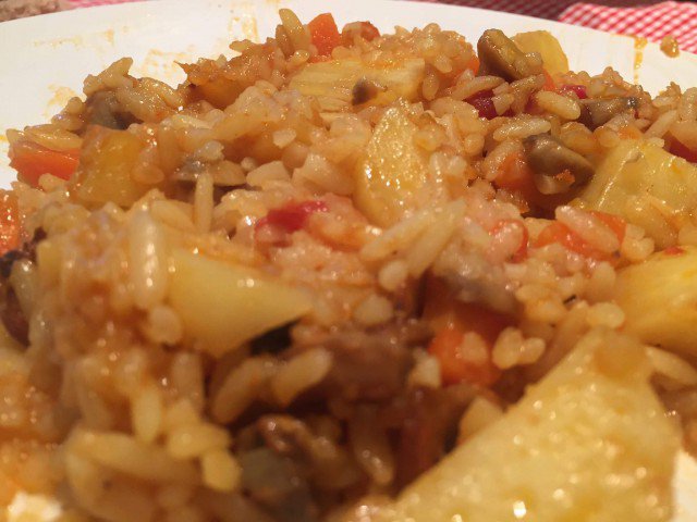 Rice with Potatoes and Tomatoes in the Oven