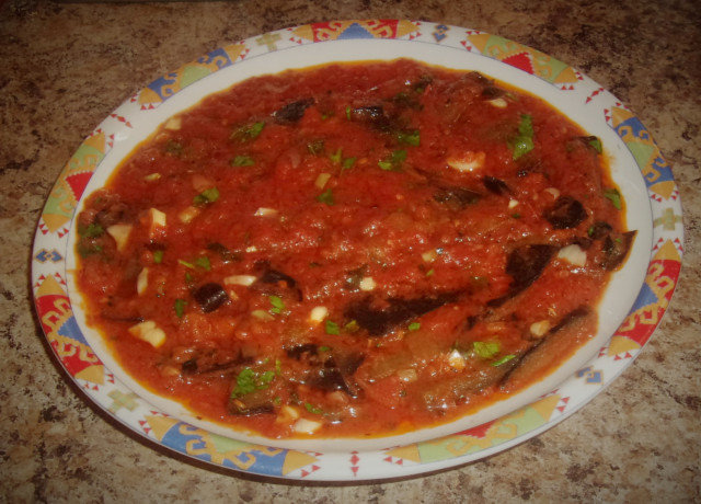 Eggplant with Tomato Sauce and Garlic in a Pan