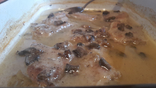 Steaks with Mushroom Sauce and Wine in the Oven
