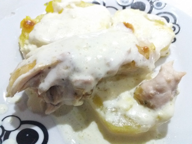 Chicken with Cream and Potatoes in a Glass Cook Pot