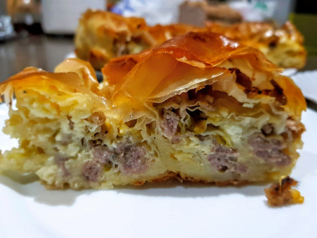 Twisted Pie with Minced Meat and White Cheese