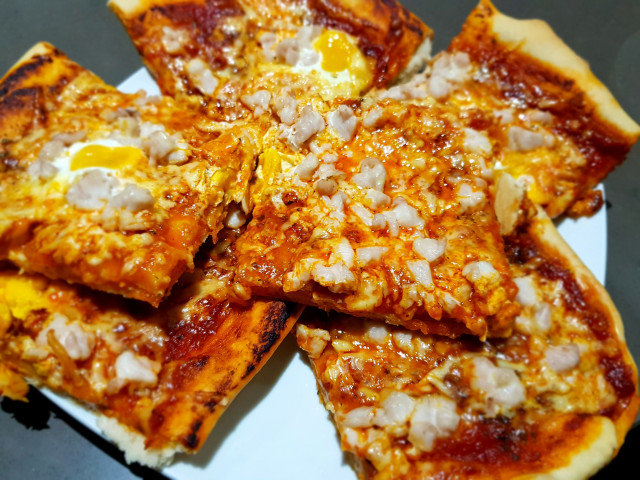 Pizza with Chicken and Quail Eggs