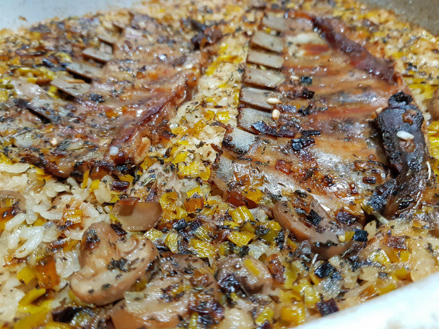 Oven-Baked Lamb Ribs with Rice and Mushrooms