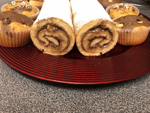Roll with Jam and Powdered Sugar