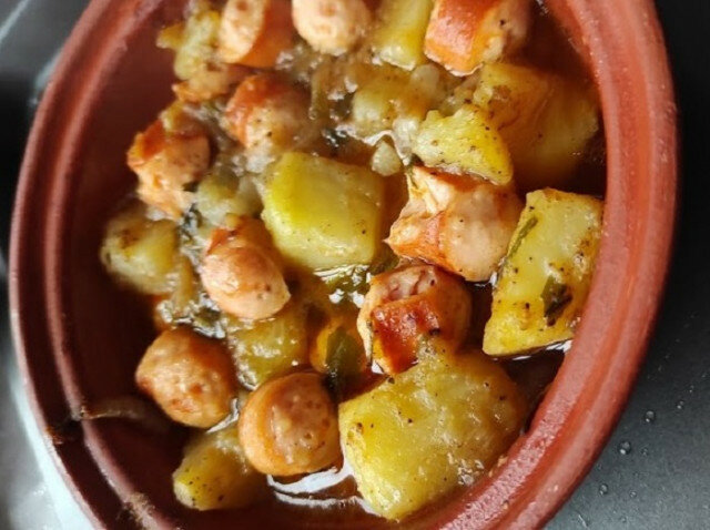 Potatoes with Sausages in a Clay Pot