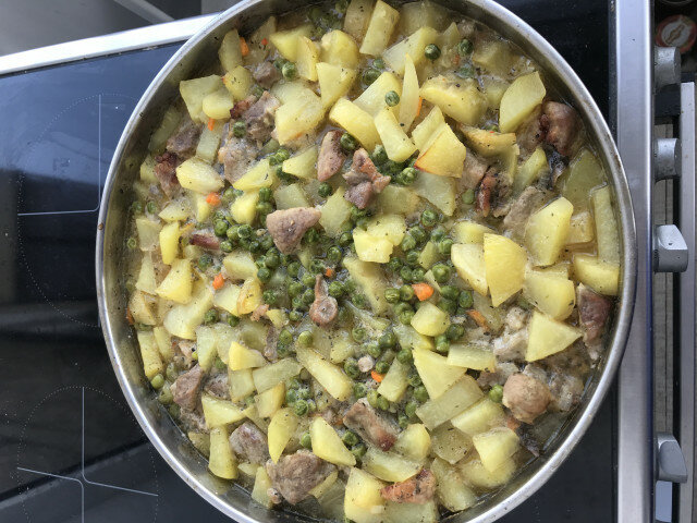 Oven-Baked Pork with Peas and Potatoes