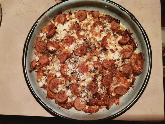 Potatoes with Vienna Sausages and Cheese in the Oven