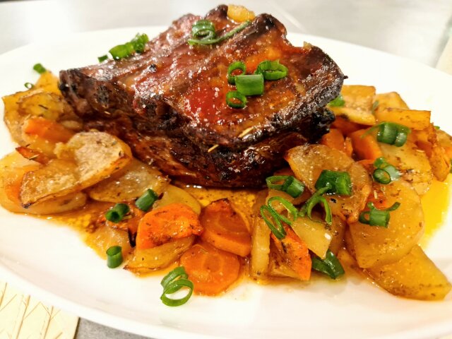 Slow Roasted Pork Belly with a Potato and Carrot Garnish