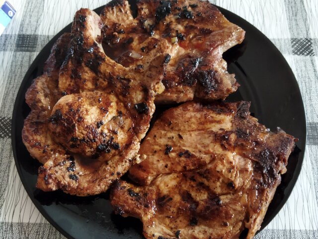 Pork Steaks on the Grill with Unique Marinade