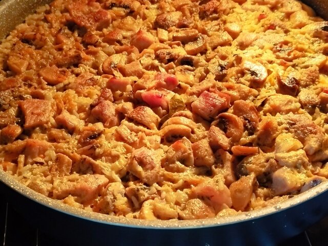 Pork with Mushrooms and Rice in the Oven